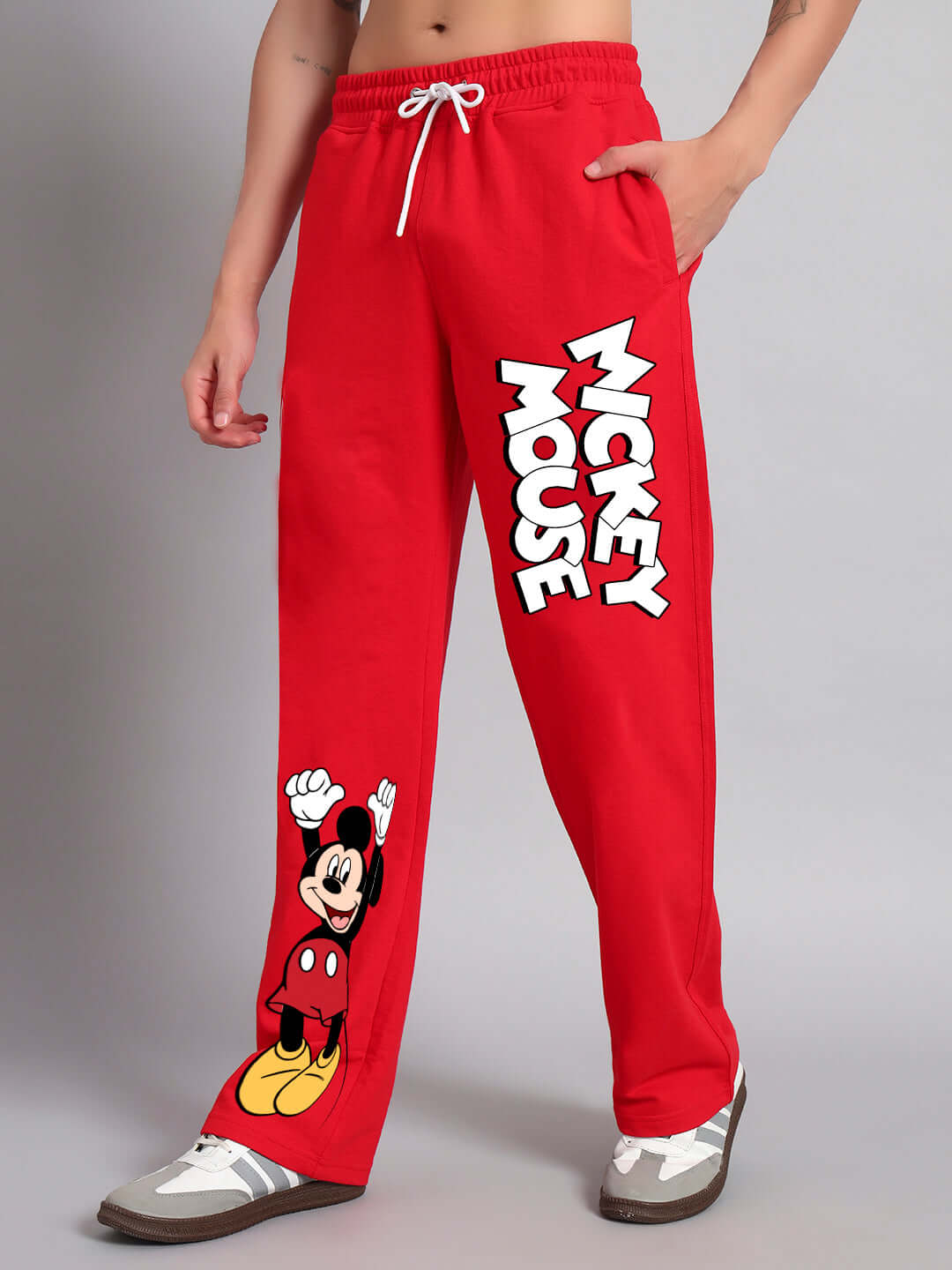 Red relaxed fit joggers featuring Mickey Mouse design, made-to-order with customizable size options.