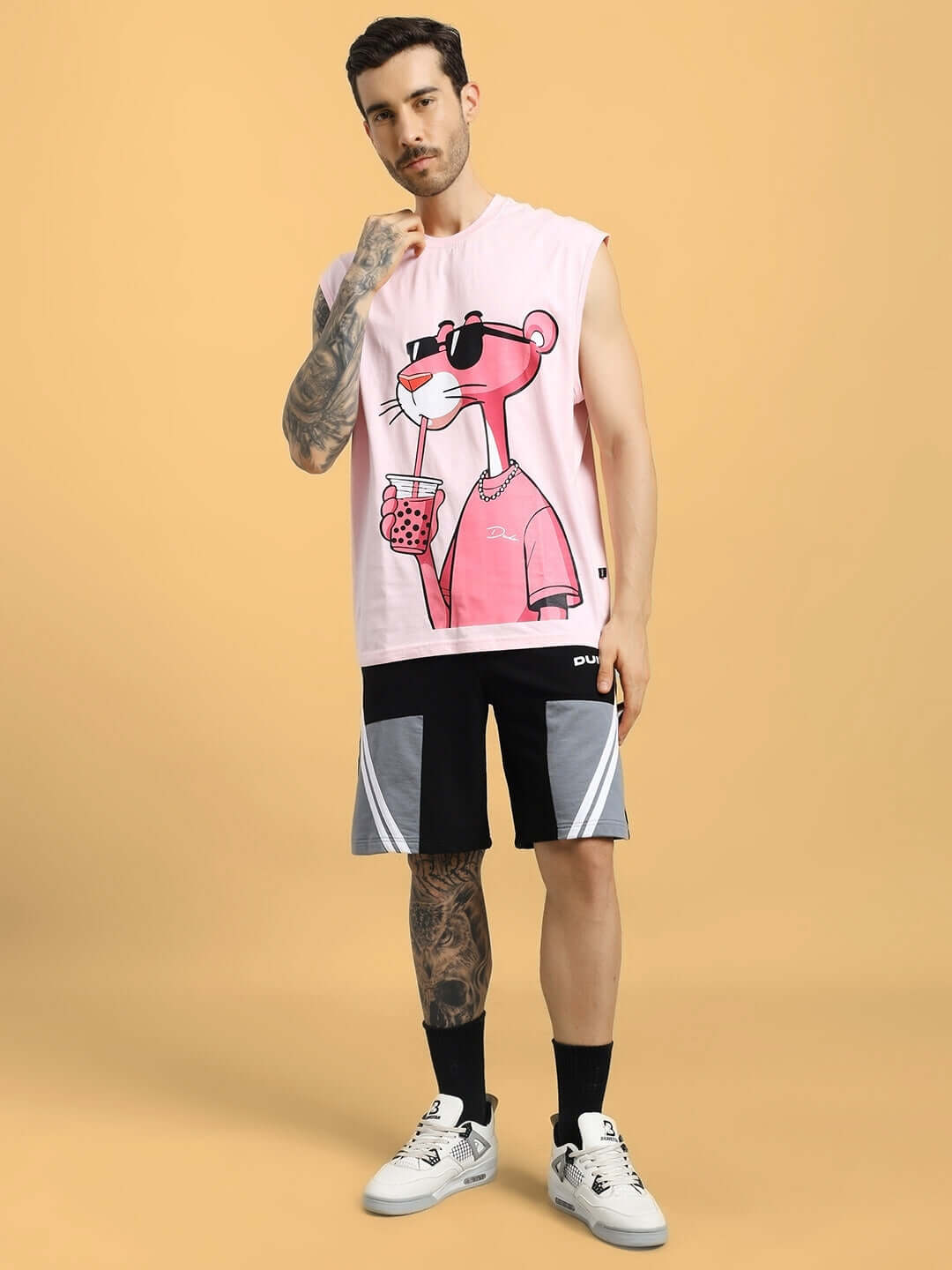 Stylish Just Chill Pink Panther Printed T-Shirt Pink worn by model. Fun, casual wear with iconic print.