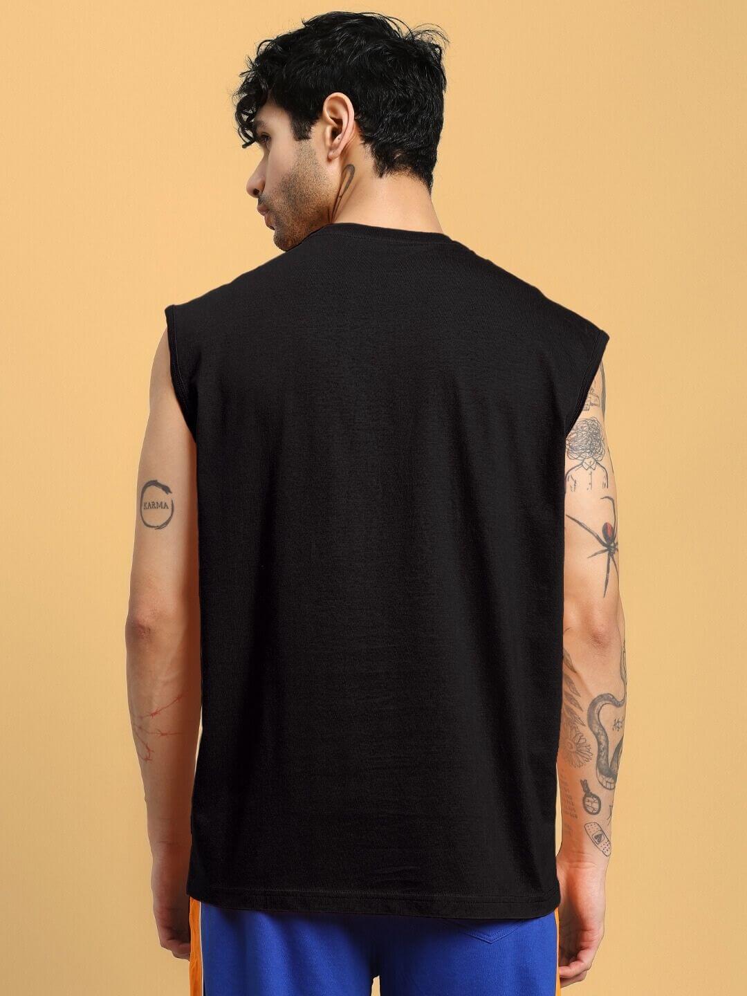 Back view of a model wearing a black JUST FOCUS fine t-shirt, highlighting custom fit options and handmade craftsmanship.