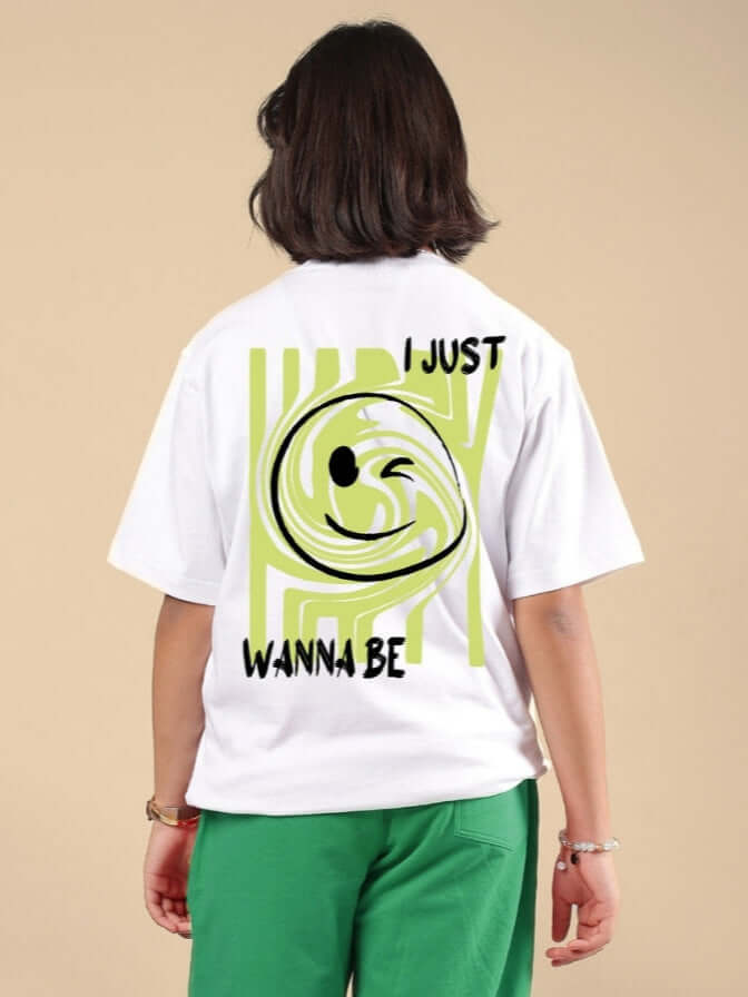 Child wearing JUST WANNA BE T-SHIRT FOR BOYS & GIRLS WHITE with bold print on back
