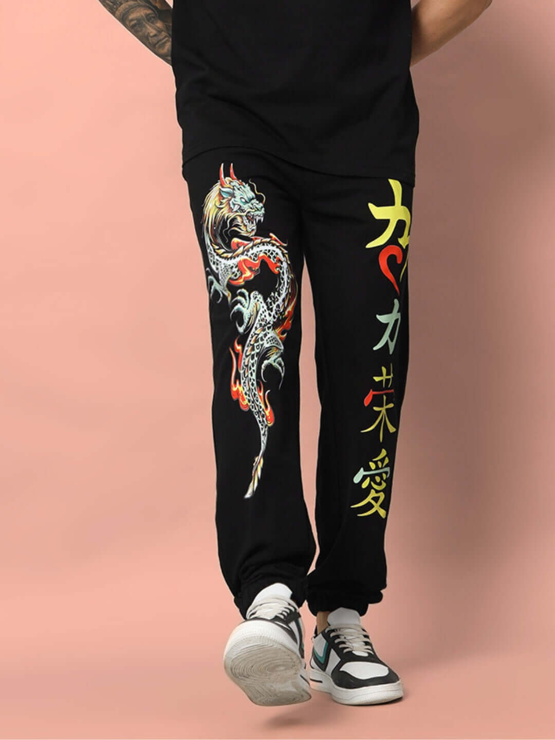 KAKAAI Relaxed Black Pant Jogger with Asian-inspired dragon and lettering design on side.