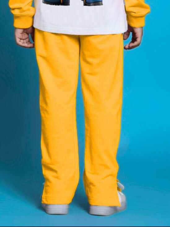 Yellow Kevin jogger for boys and girls, made-to-order by DUDS, shown from the back, features customizable fit options.