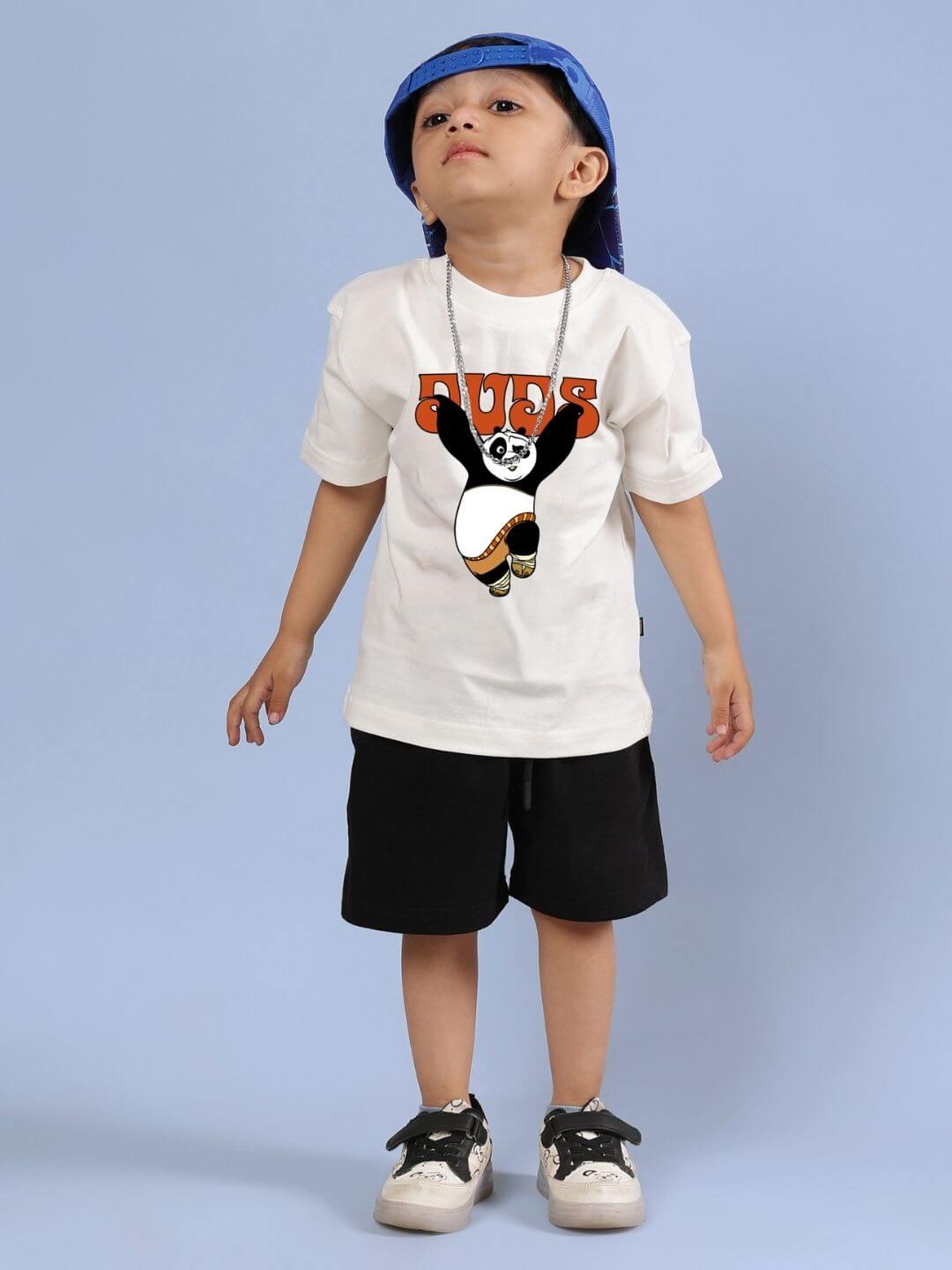 Child wearing Kung Fu Panda co-ord set with off-white T-shirt and black shorts, showing a playful design for boys and girls.