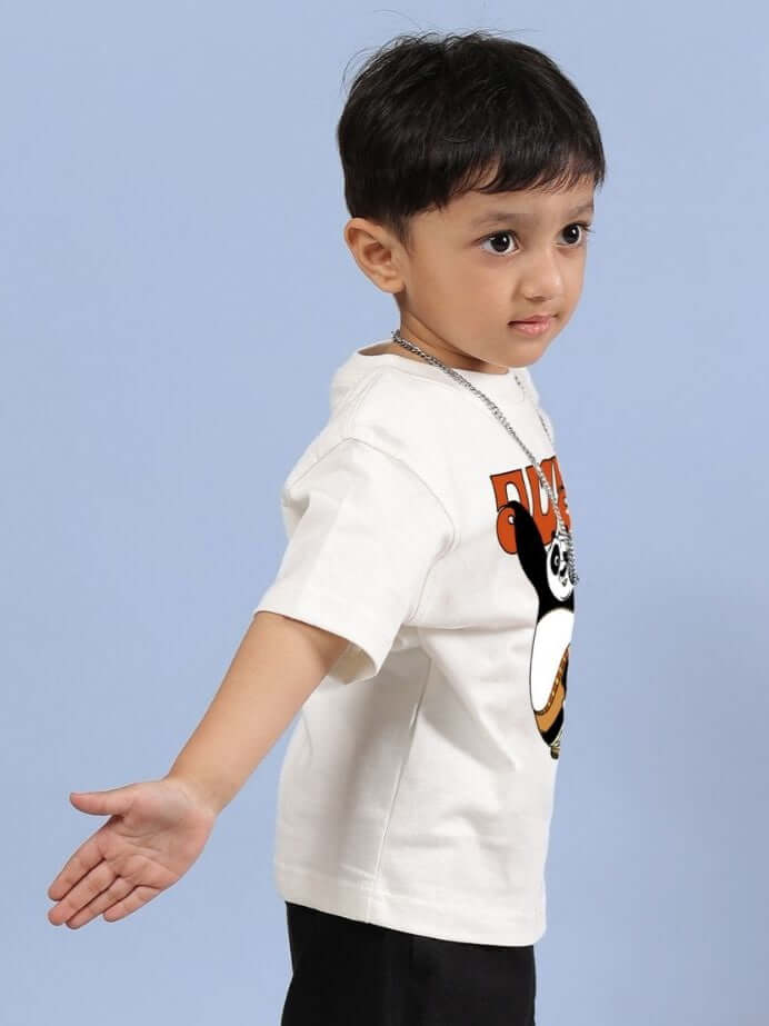 Child wearing an off-white Kung Fu Panda T-shirt, showcasing playful design and comfortable fit for boys and girls, KUNG FU PANDA T-SHIRT FOR BOYS AND GIRLS OFF WHITE