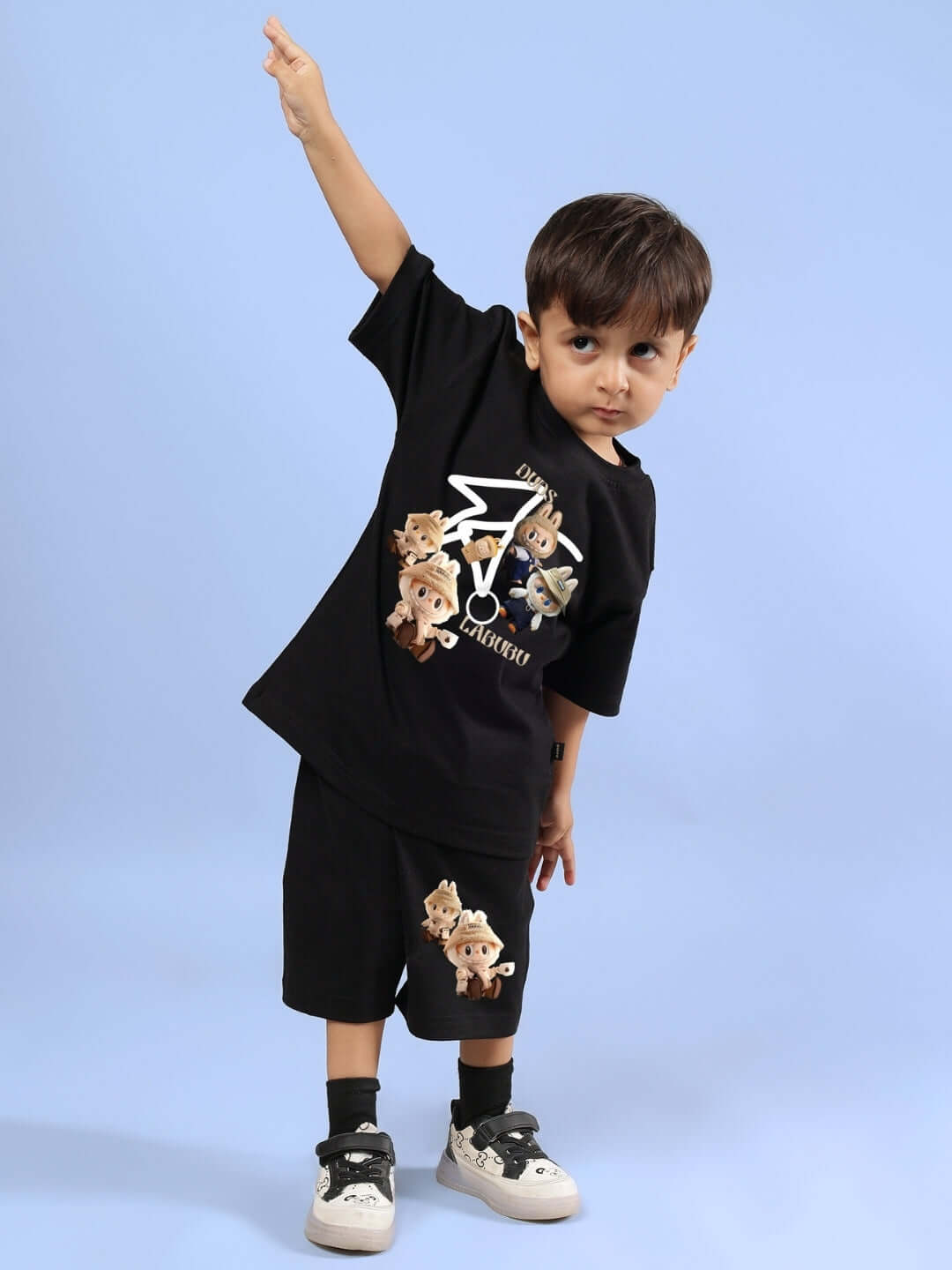 Child wearing LABUBU GANG CO-ORD FOR BOYS GIRLS BLACK with playful Labubu Gang print, perfect for unisex outfits in trendy streetwear style.