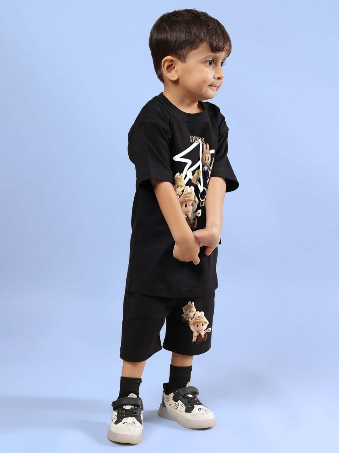 Child wearing LABUBU GANG CO-ORD FOR BOYS GIRLS BLACK outfit with playful Labubu Gang print, perfect for school or playdates.