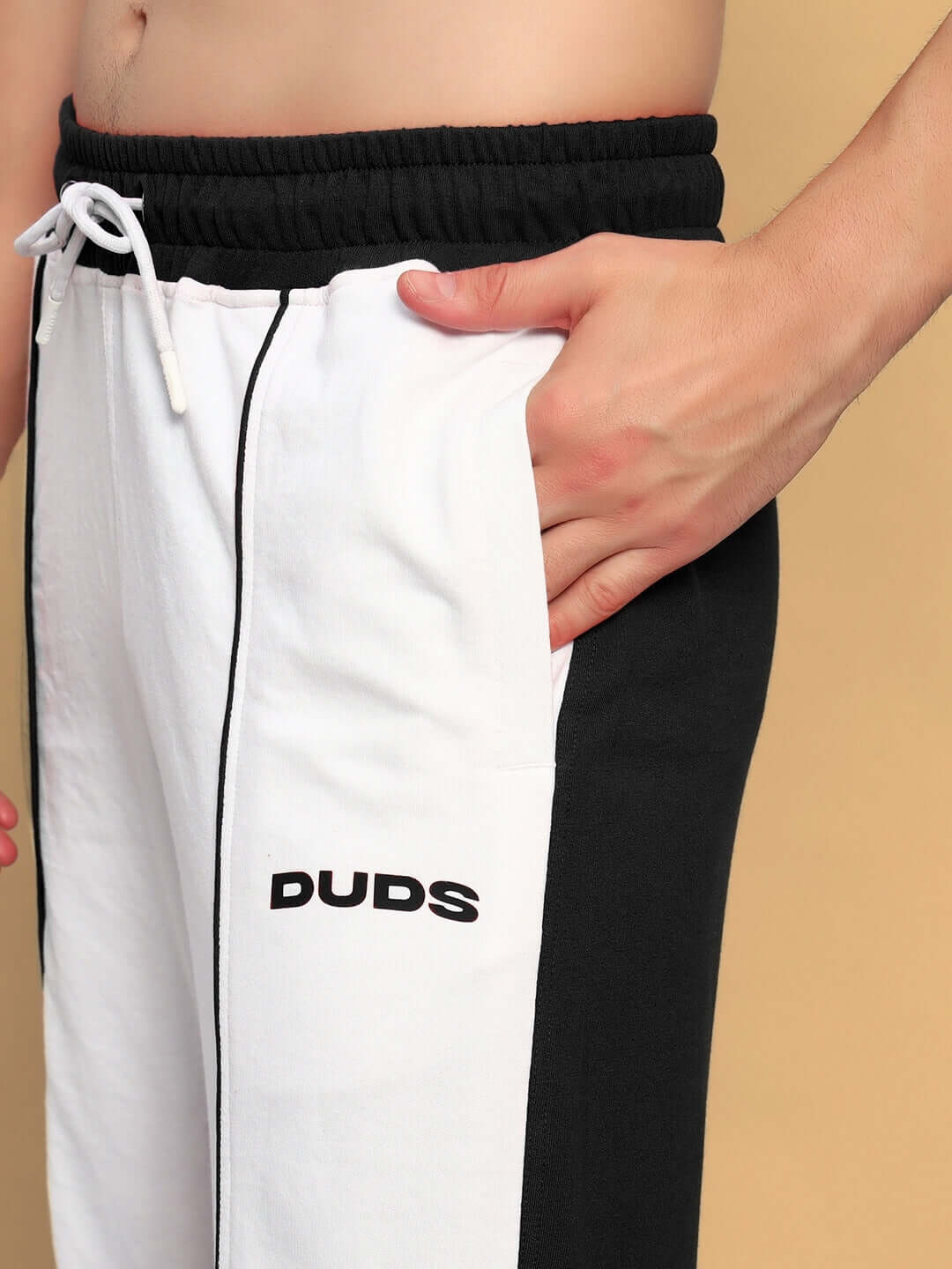 LAGOON RELAXED FIT JOGGERS WHITE BLACK with side pockets by DUDS, featuring a comfortable drawstring waistband, perfect for casual wear.