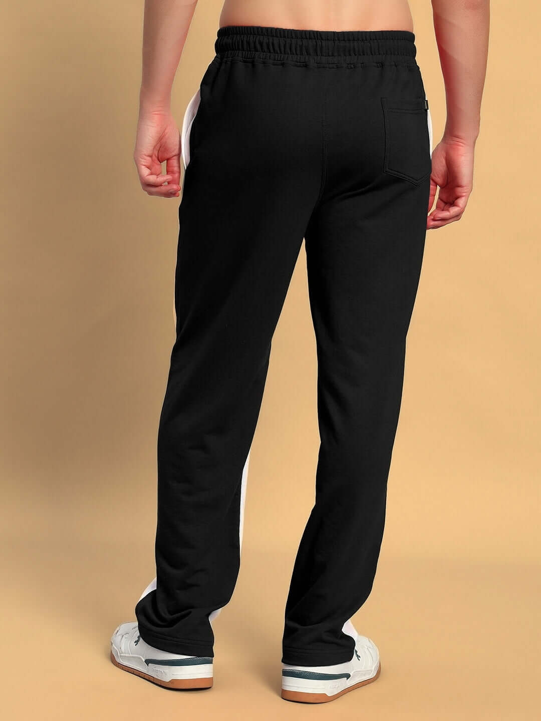 Back view of LAGOON RELAXED FIT JOGGERS WHITE BLACK showing custom fit design.