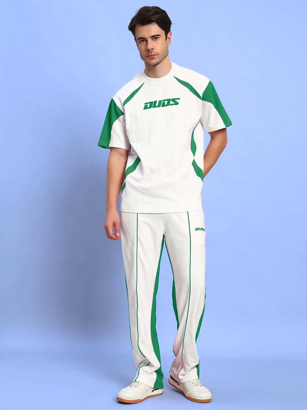 Model wearing LAGOON RELAXED FIT JOGGERS WHITE GREEN with matching top, showing front view.