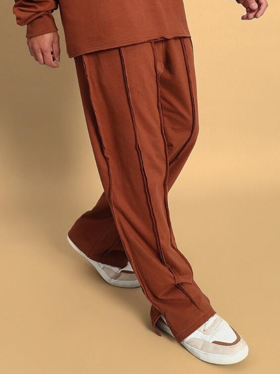 LAMINA brown side slit joggers, made to order by DUDS, featuring customizable fit and stylish design.