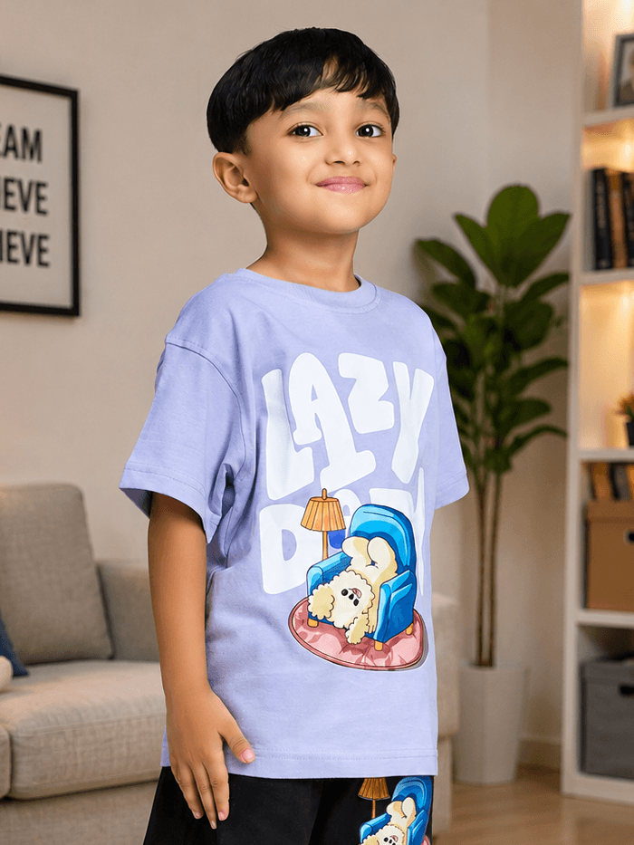 LAZY DAY T-SHIRT FOR BOYS GIRLS LAVENDER worn by a smiling child in a cozy indoor setting.