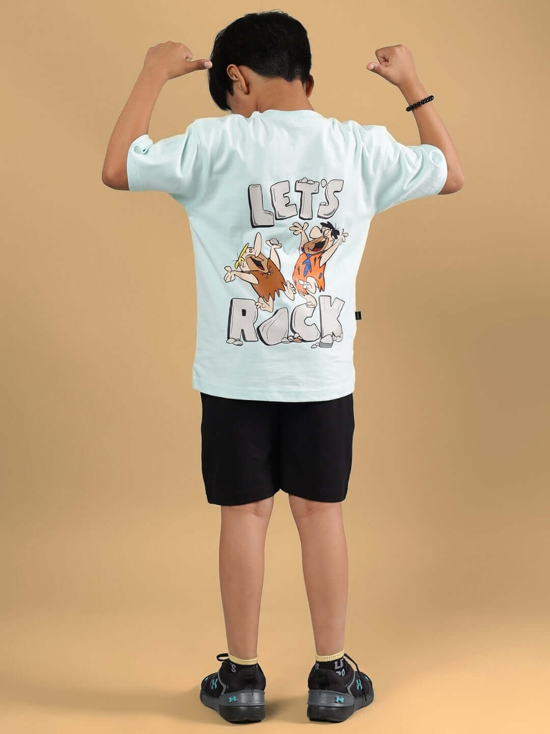 Child wearing LET'S ROCK CO-ORD FOR BOYS & GIRLS S BLUE-BLACK set showcasing stylish casual fashion.