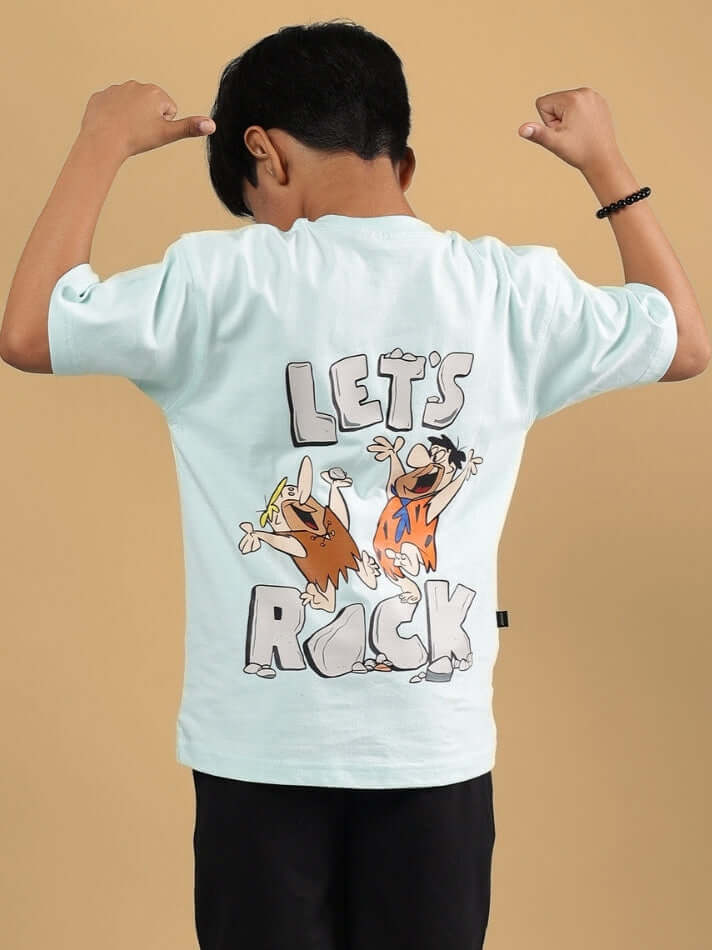 Boy wearing LET'S ROCK T-SHIRT FOR BOYS & GIRLS SKY BLUE with cartoon design on back
