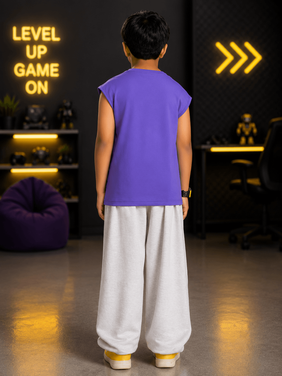LEVELUP GAMER CO-ORD FOR BOYS GIRLS PURPLE WHITE showcased on a kid, featuring a purple top and gray pants.