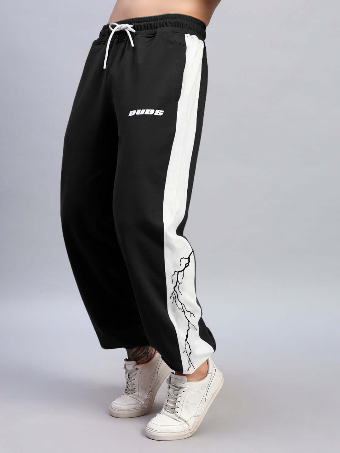 LIGHTNING BOLT RELAXED FIT JOGGERS BLACK-WHITE with bold design and relaxed silhouette, perfect for streetwear and casual outings.