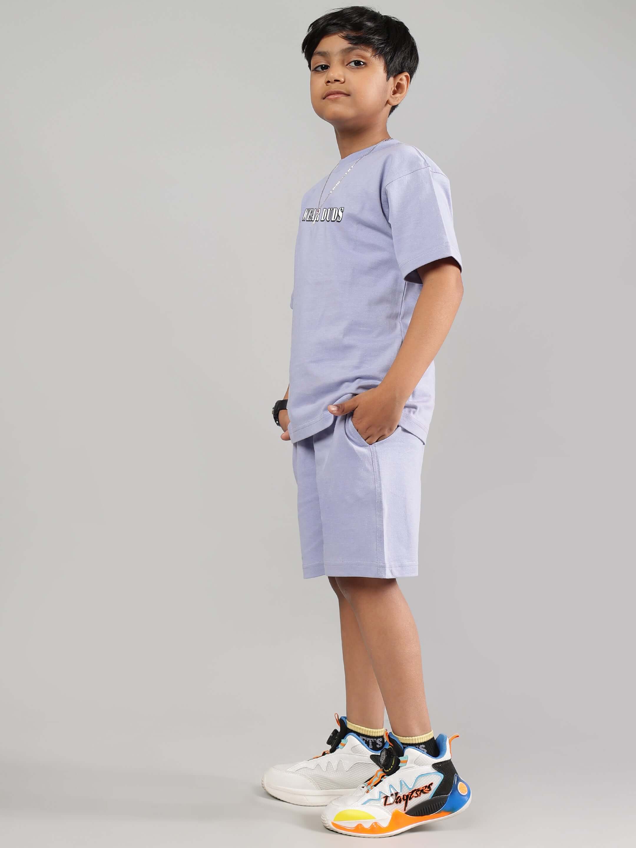 Child wearing RAPPER BUNNY CO-ORD FOR BOYS GIRLS LILAC with sneakers, displaying trendy, comfortable, and playful style.