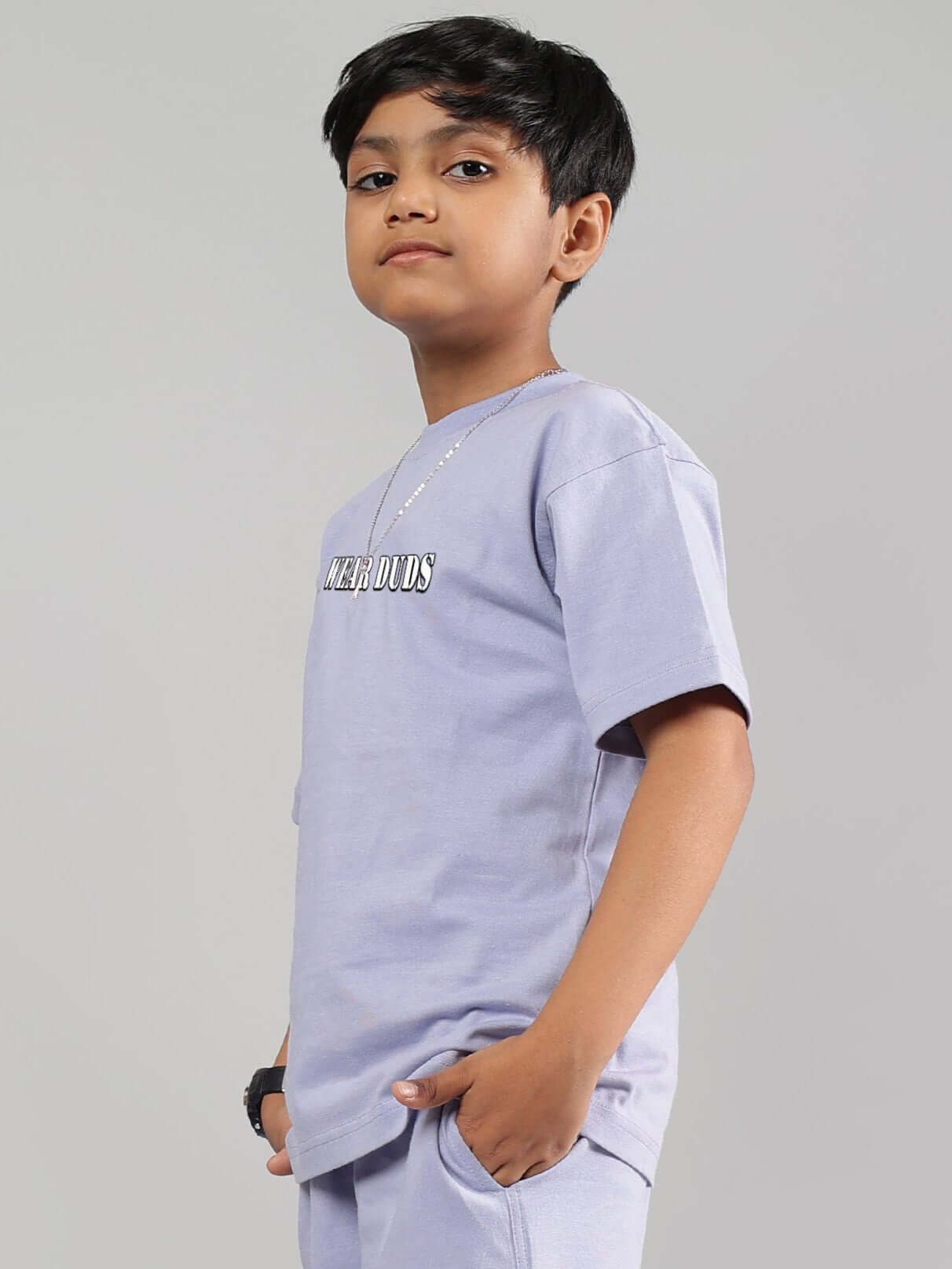 Boy wearing a lilac Rapper Bunny t-shirt from DUDS, featuring casual fit for boys and girls. Made to order and customizable sizing.