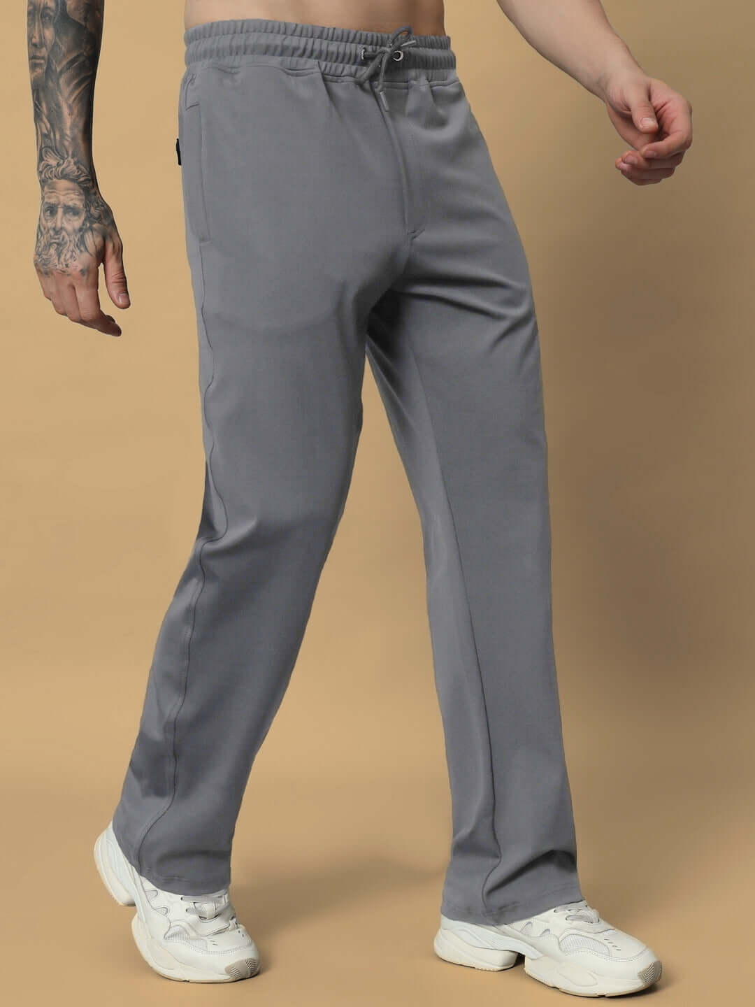 Model wearing grey LIMBER RELAXED PANT JOGGER by DUDS, showcasing adjustable fit and comfortable design.
