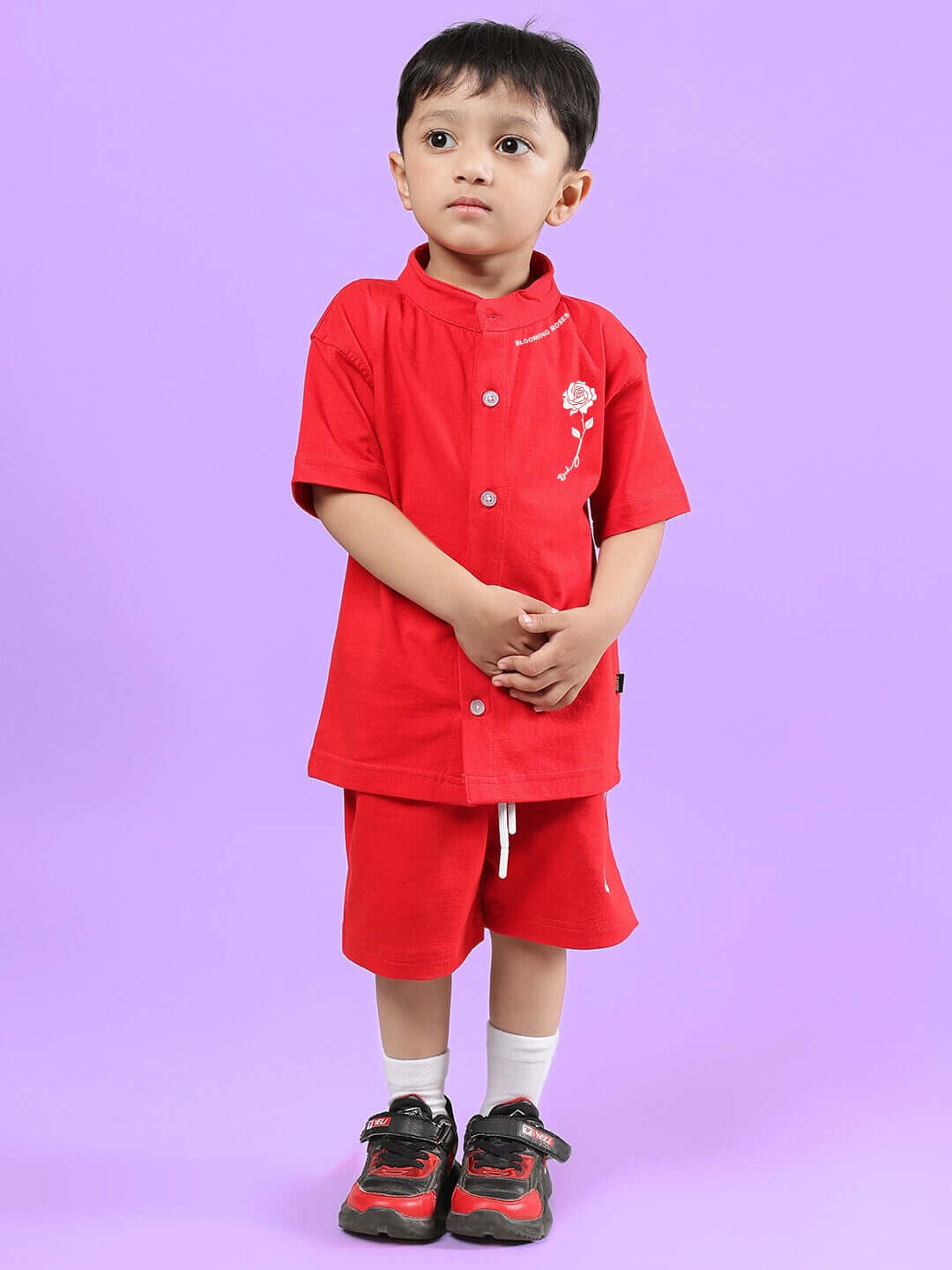 Child wearing LIMBO CO-ORD FOR BOYS & GIRLS RED, made to order with custom fit option available. Stylish and comfortable co-ord set.