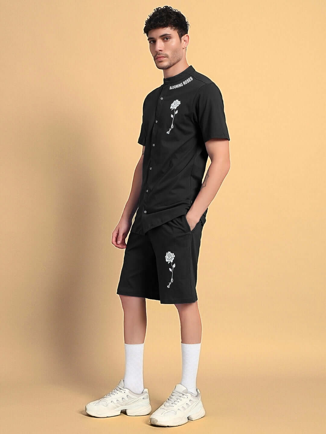 LIMBO black co-ord set made from premium cotton and elastane with flower print, ideal for casual wear, featured on a male model.