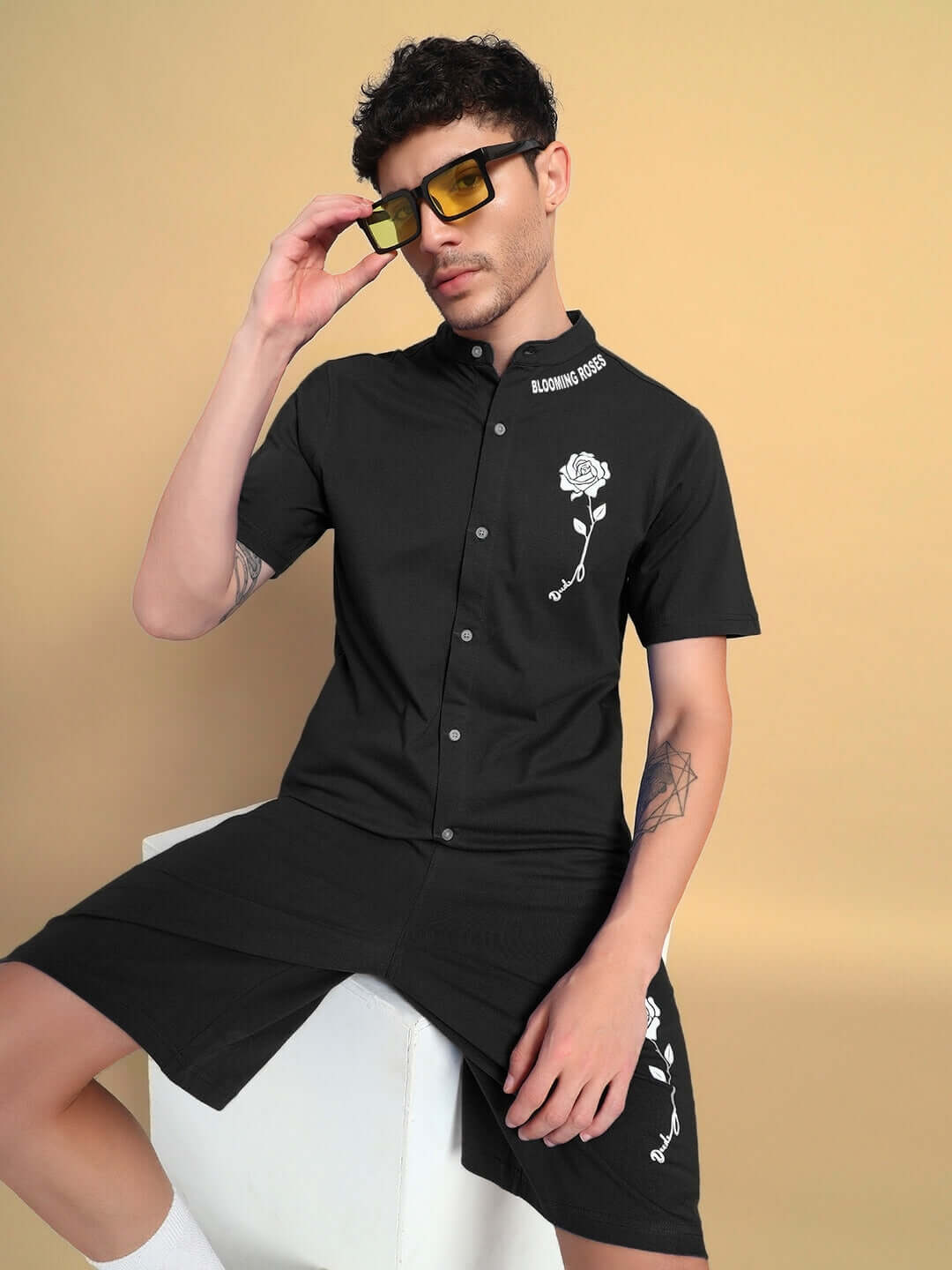 LIMBO black regular fit shirt in premium cotton terry fabric worn by model, featuring white rose embroidery and stylish button-down design.
