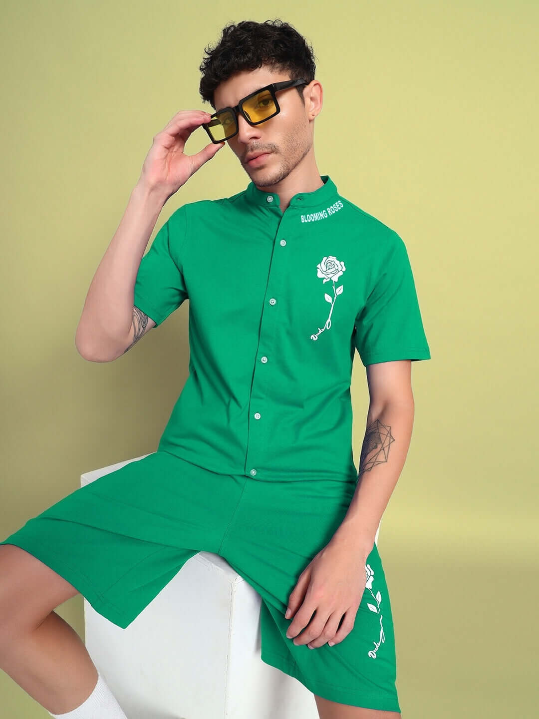 Model wearing LIMBO regular fit shirt in green made of premium cotton terry, showcasing casual style with unique design details.