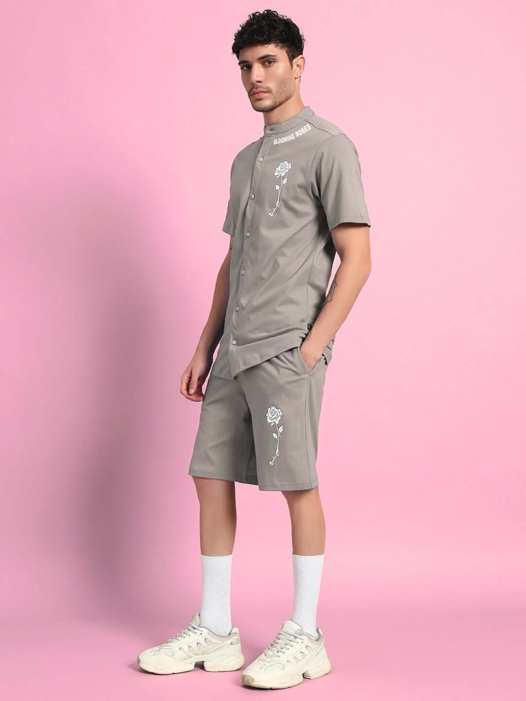 Man wearing LIMBO CO-ORD Set in grey, featuring premium cotton French Terry Lycra shirt and cotton shorts, styled for a modern look.