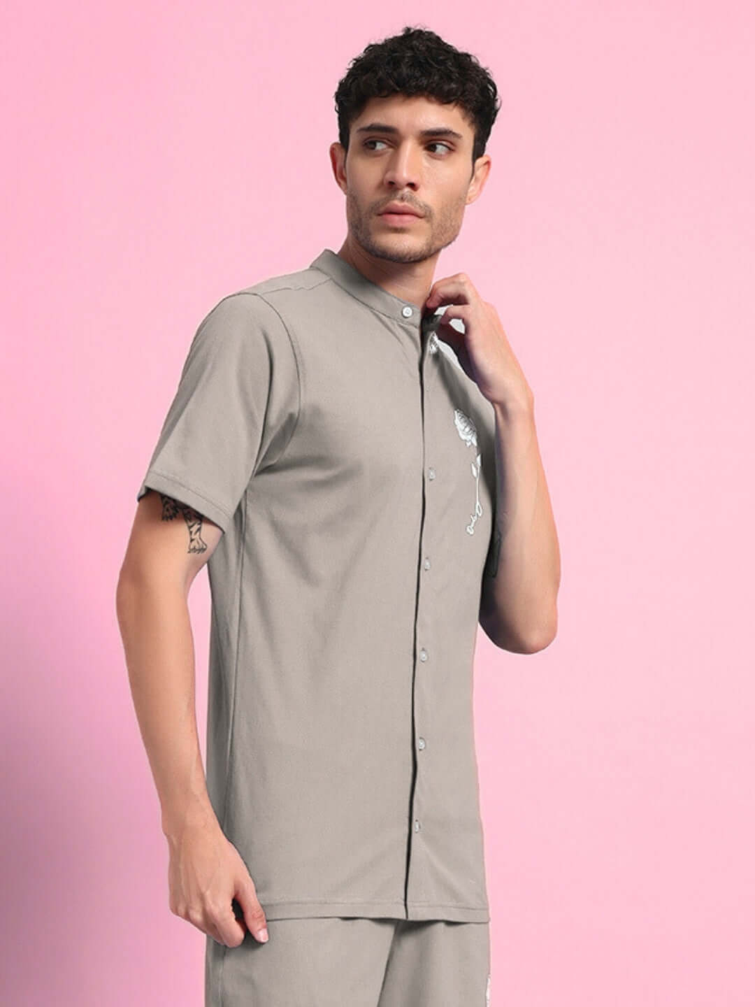 Model wearing a grey Limbo Regular Fit Shirt made from premium heavy gauge cotton, featuring short sleeves and a button-up design.