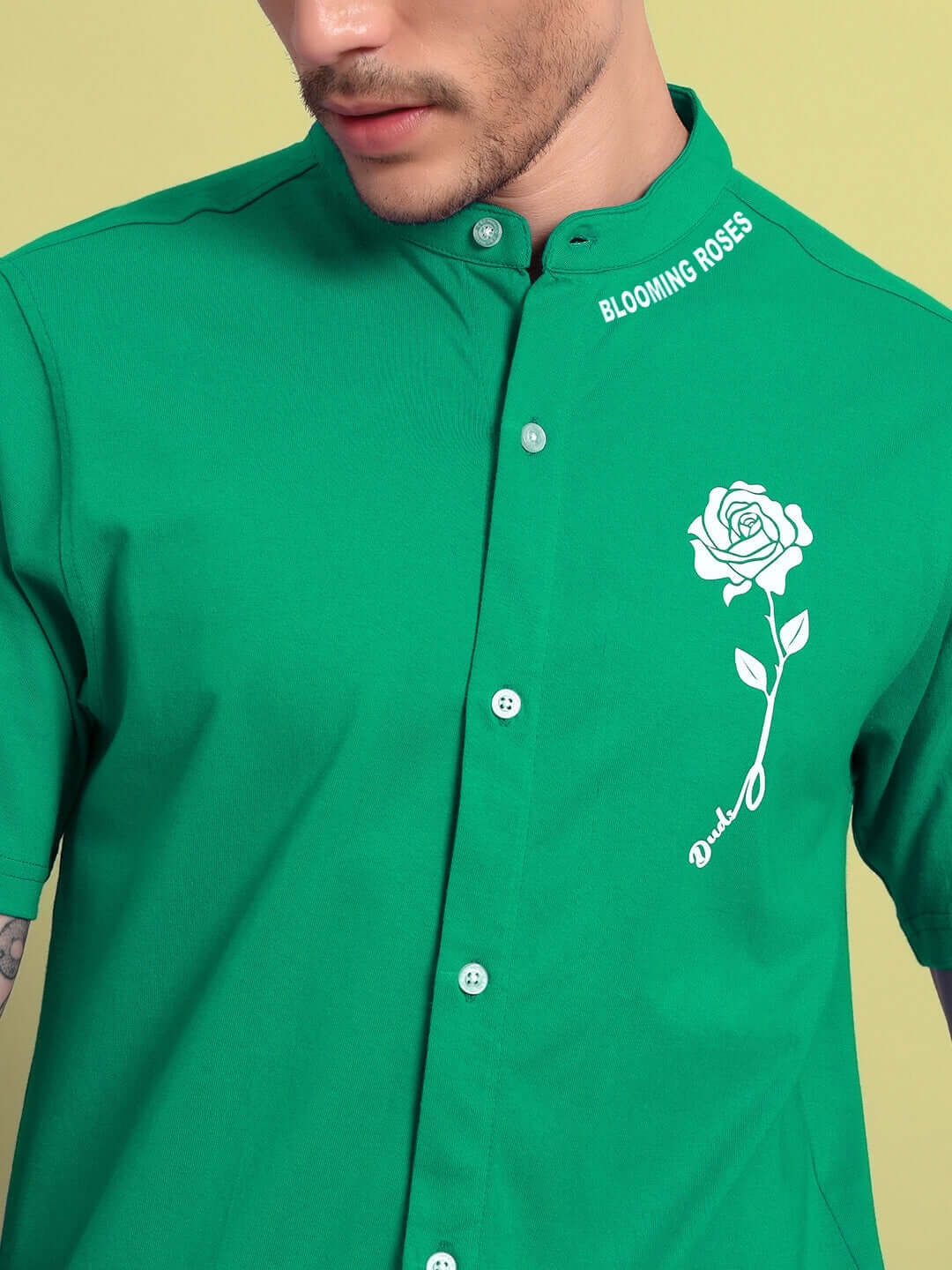 Green Limbo regular fit shirt with rose embroidery and "Blooming Roses" text on collar, premium cotton-lycra blend.