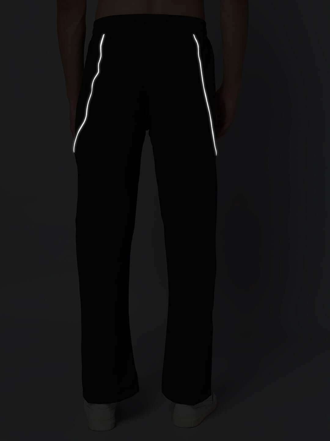 Black LOCO Reflector Parachute Cargo Pants with reflective details for nighttime visibility.