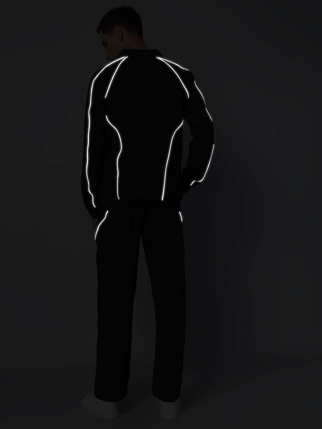 LOCO OVERSIZED CO-ORD SET BLACK in reflective light, showcasing streetwear style and comfort.