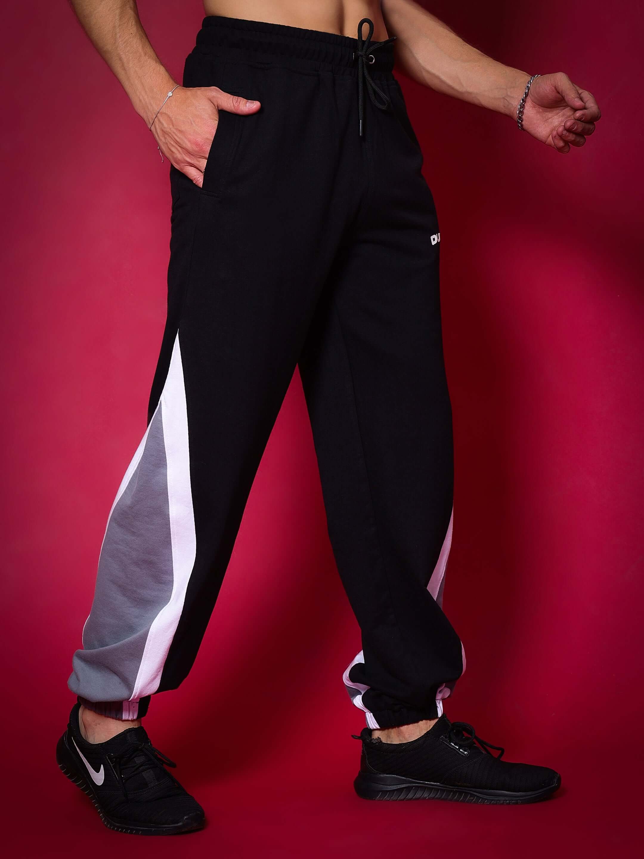 LOVE TRIANGLE Baggy Joggers in black-grey with custom fit option for made-to-order tailoring by DUDS.