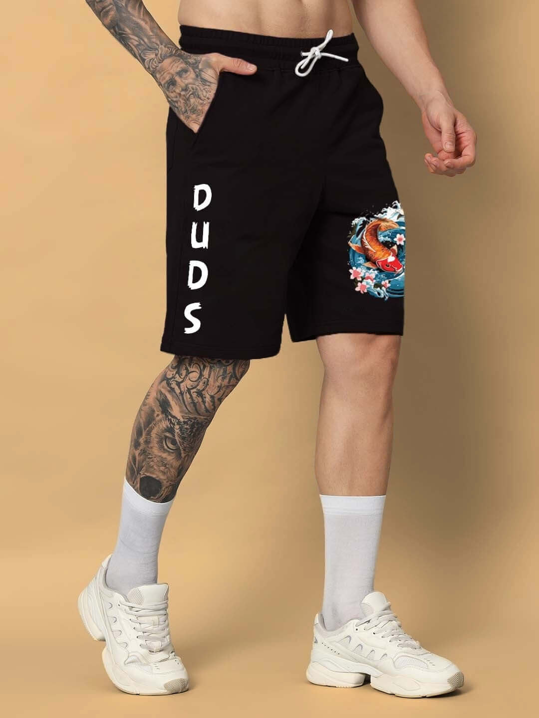 Man wearing MAJESTIC FISH Regular Fit Black Shorts with DUDS logo and colorful design, custom fit available.
