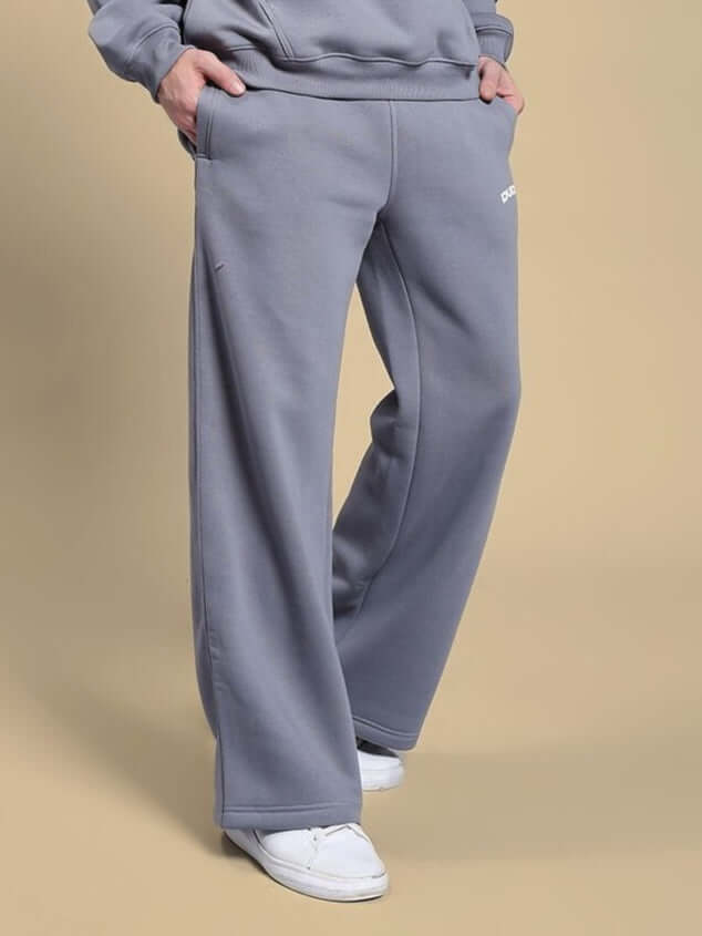 Person wearing MAKE IT HAPPEN COTTON FLEECE JOGGER GREY showing comfort and style against a neutral background.