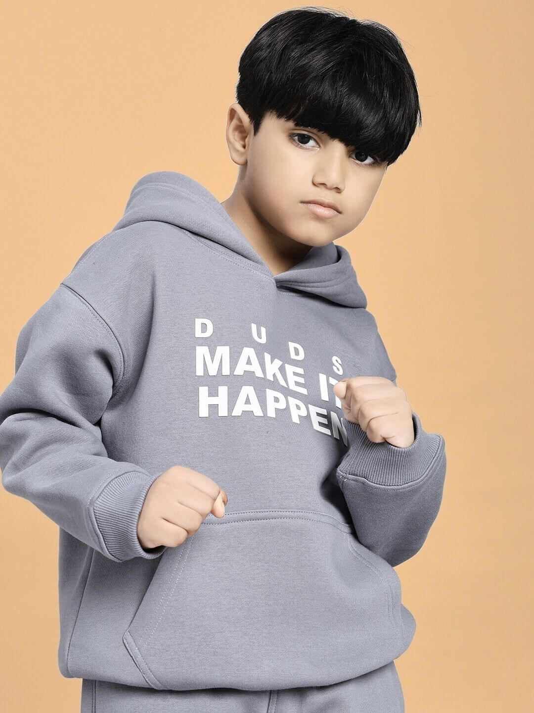 Child wearing MAKE IT HAPPEN FLEECE CO-ORD FOR BOYS AND GIRLS GREY, showcasing warmth and style in a cozy two-piece outfit.