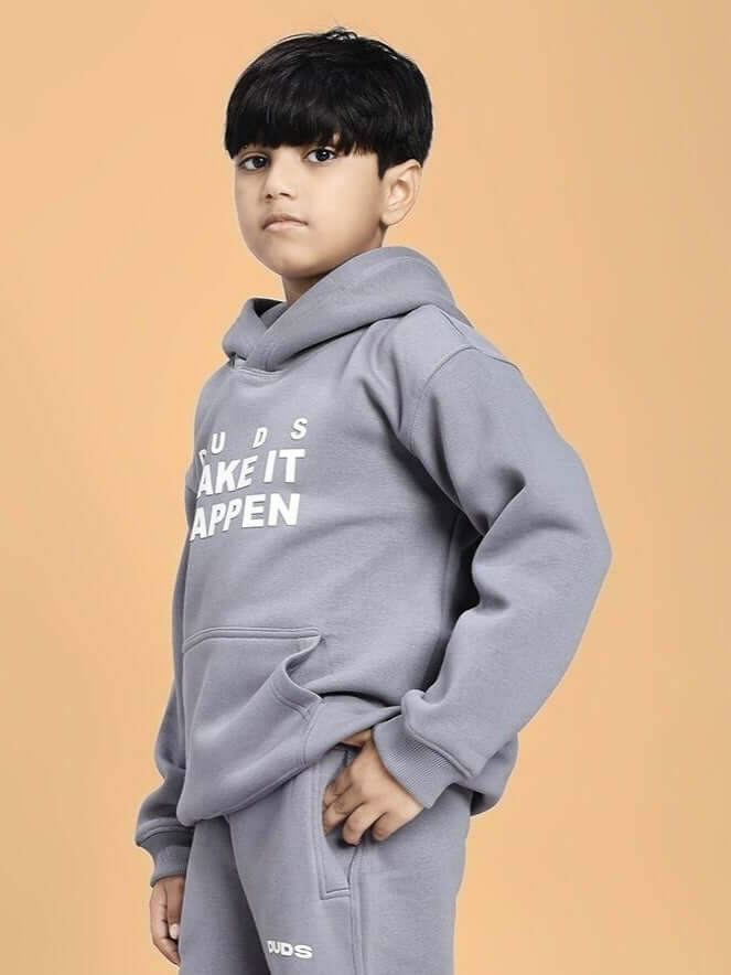 MAKE IT HAPPEN FLEECE HOODIE FOR BOYS AND GIRLS GREY worn by child, showcasing soft brushed fleece with adjustable hood for stylish comfort