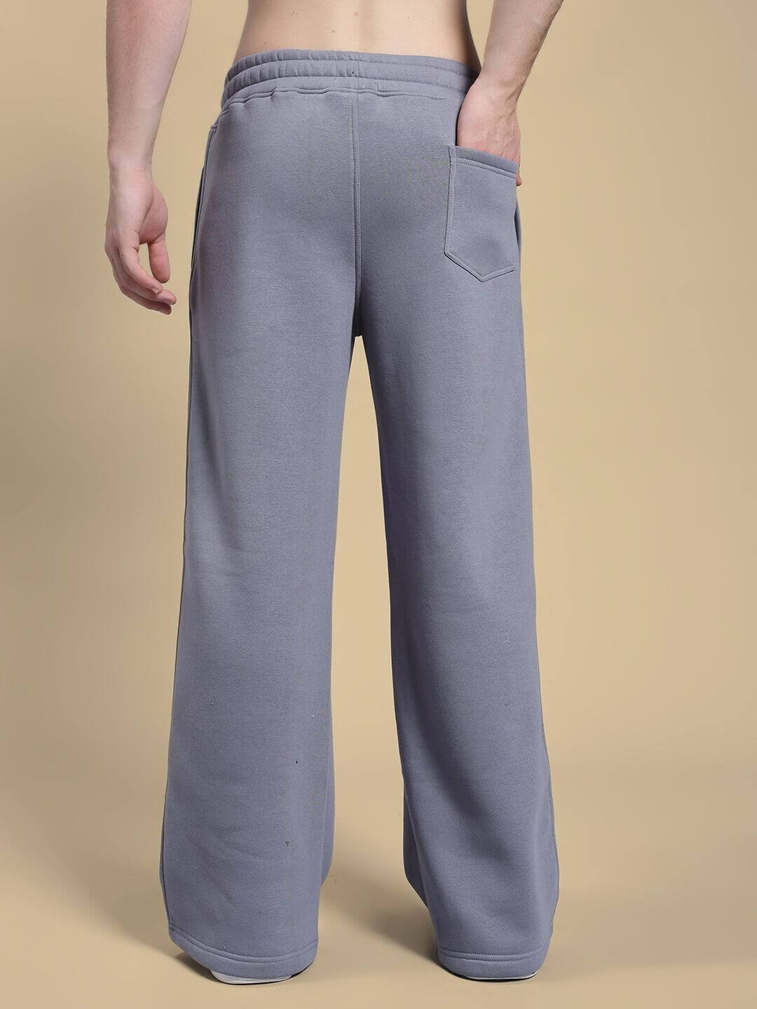 Rear view of MAKE IT HAPPEN COTTON FLEECE JOGGER GREY showcasing comfortable fit and back pocket design.