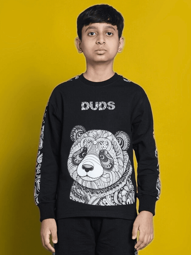 MASHA OVER-SIZED SWEATSHIRT FOR BOYS GIRLS BLACK with panda graphic worn by child against yellow background