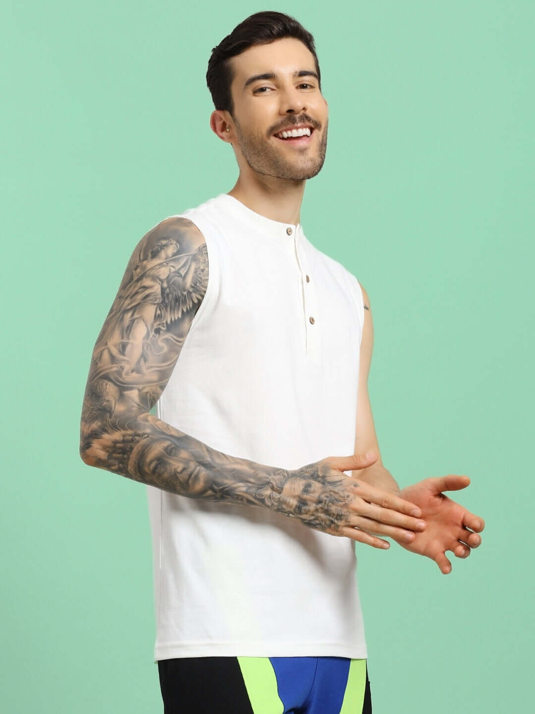 Man wearing OLIN REGULAR FIT T-SHIRT OFF-WHITE, showcasing casual style and comfort in high-quality cotton fabric.