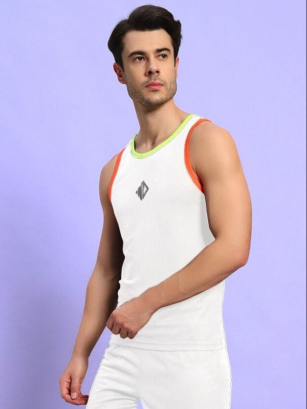 Man wearing a stylish white athletic tank top with colorful trim, showcasing a contemporary fitness style against a purple background.