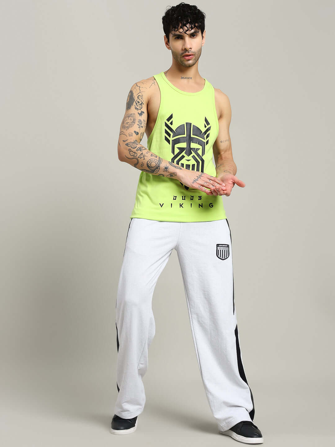 Model wearing ROYALSON COTTON JOGGERS MELANGE-GREY with a neon top showcasing modern loungewear style.