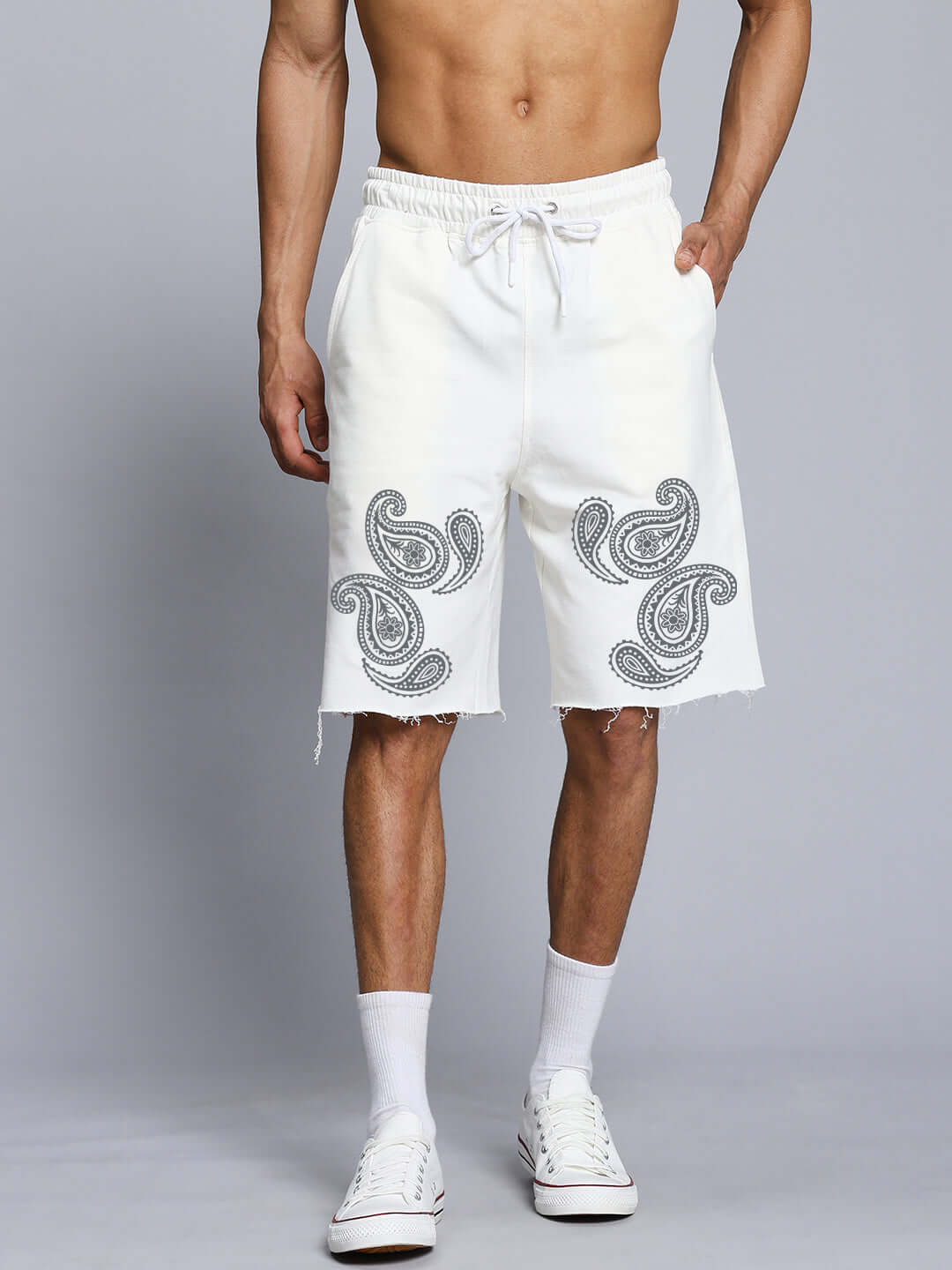 Alt Tag: Model wearing Messi Paisley Print Regular Fit Shorts Off White with intricate paisley design, focuses on style and comfort.