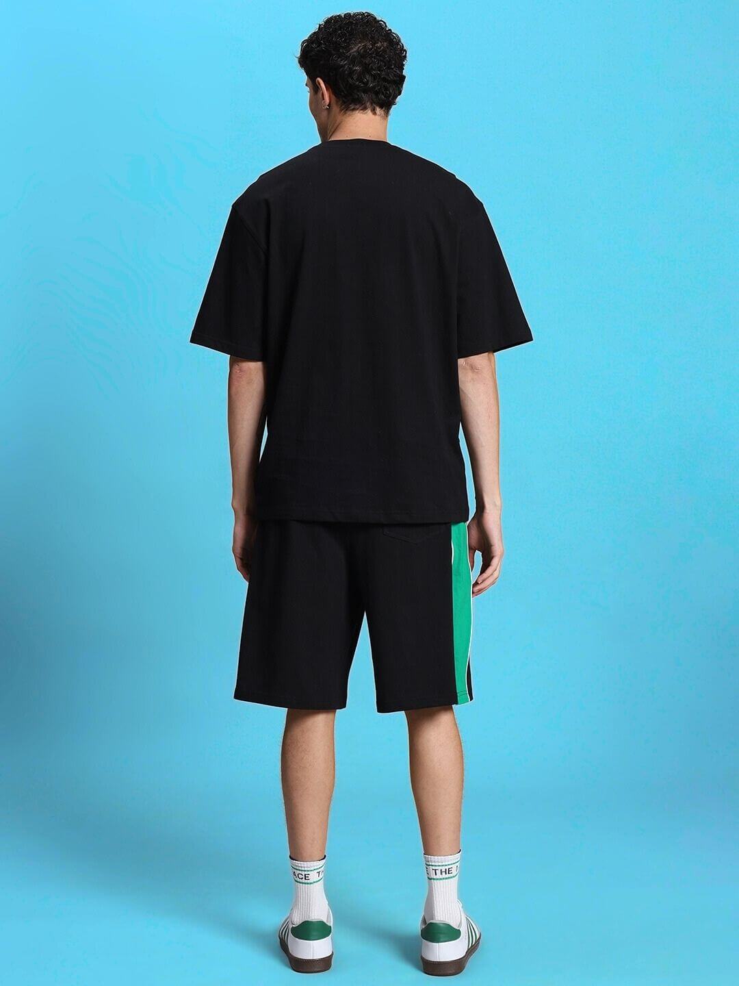 Back view of METEORIC SUMMER CO-ORD SET BLACK showcasing streetwear design and comfort for warm days.