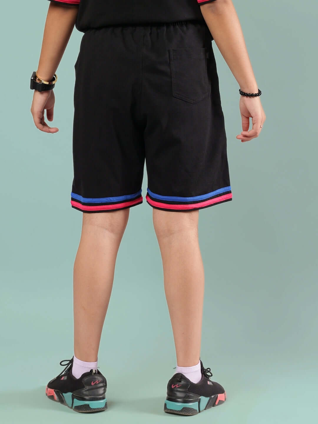 Back view of MIAMI SHORTS FOR BOYS & GIRLS BLACK with colorful trim, perfect for casual wear.