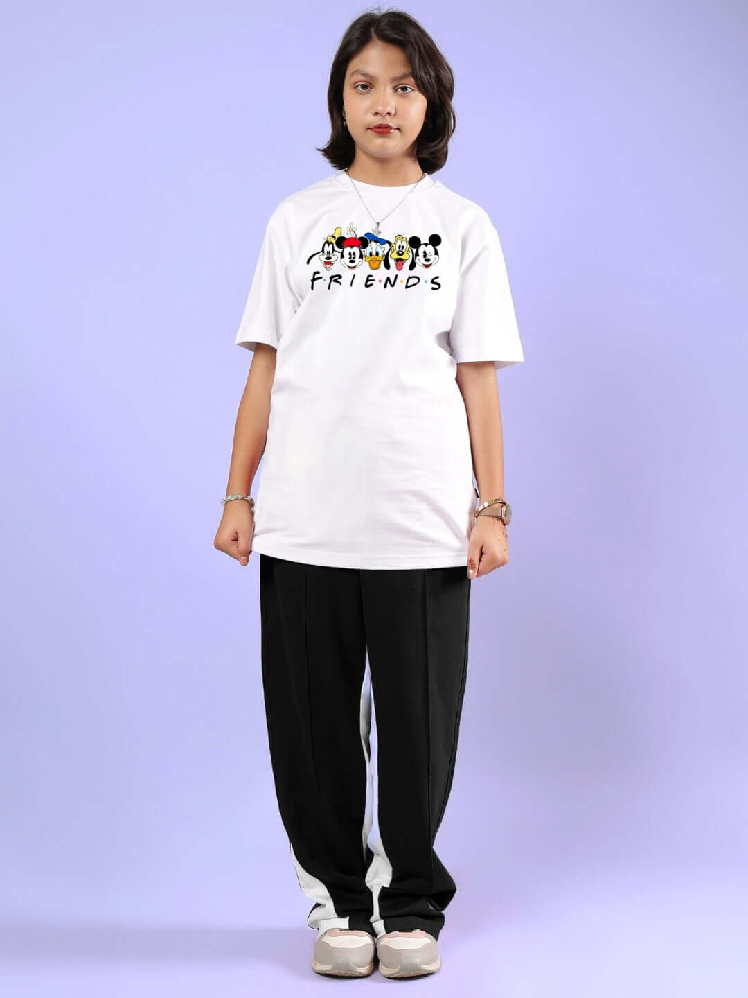 Young model wearing MICKEY AND FRIENDS T-SHIRT FOR BOYS & GIRLS WHITE, featuring Disney characters, customizable size available.