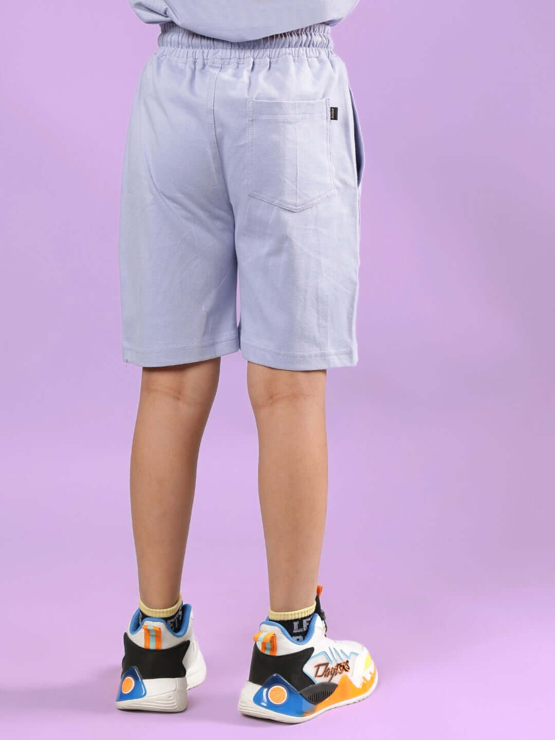 Back view of MICKEY DINGO CO-ORD FOR BOYS & GIRLS LAVENDER shorts with sneakers