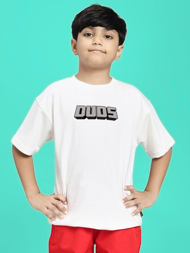 Boy wearing MINECRAFT T-SHIRT FOR BOYS GIRLS WHITE with Minecraft-inspired graphic on a white background.