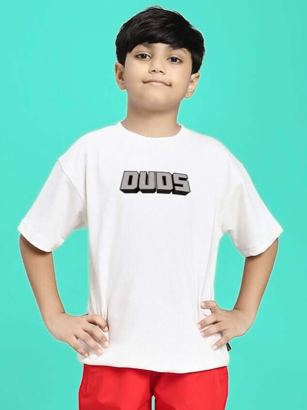 Boy wearing MINECRAFT T-SHIRT FOR BOYS GIRLS WHITE with Minecraft-inspired graphic on a white background.