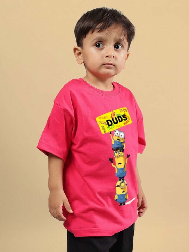 Child wearing Minion Cartoon T-Shirt for Boys and Girls pink featuring fun Minion design, ideal for playful style and comfort.