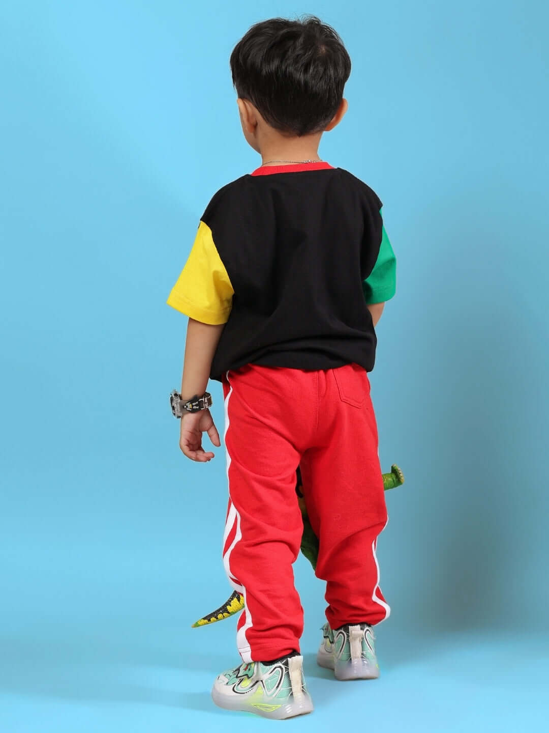MOCHA CO-ORD FOR BOYS & GIRLS BLACK RED worn by a child in a colorful outfit, showcasing back view